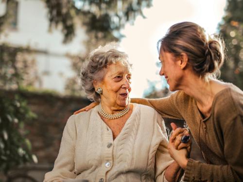 Person with elderly woman