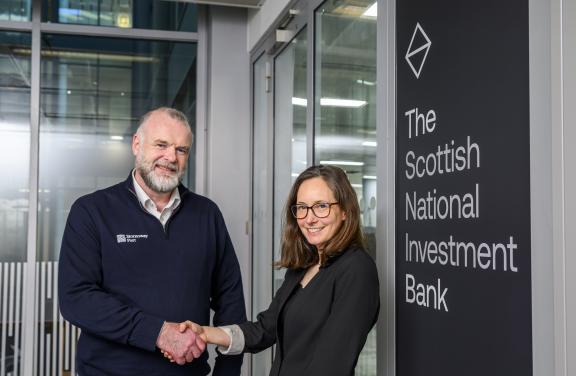 Reps from Stornoway Port and the Bank shaking hands